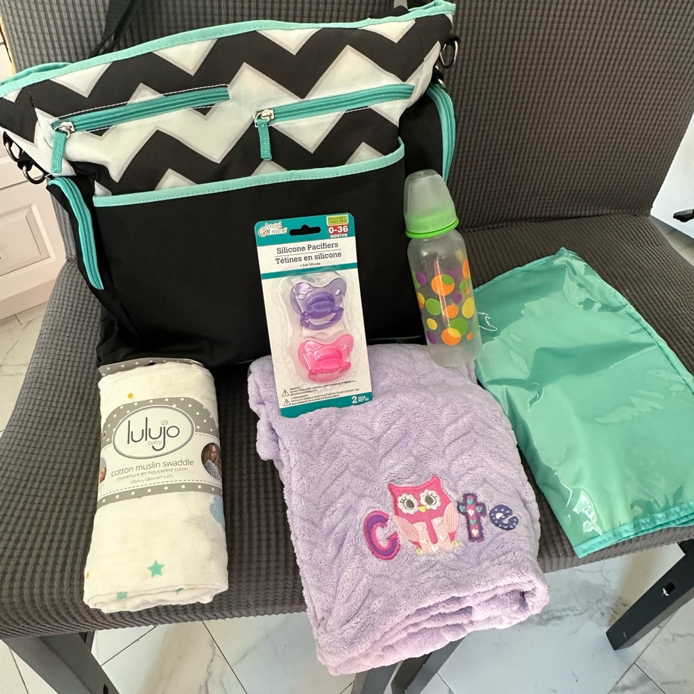 iPack baby Diaper Bag with change Pad, blanket, pacifiers, swaddle and baby bott